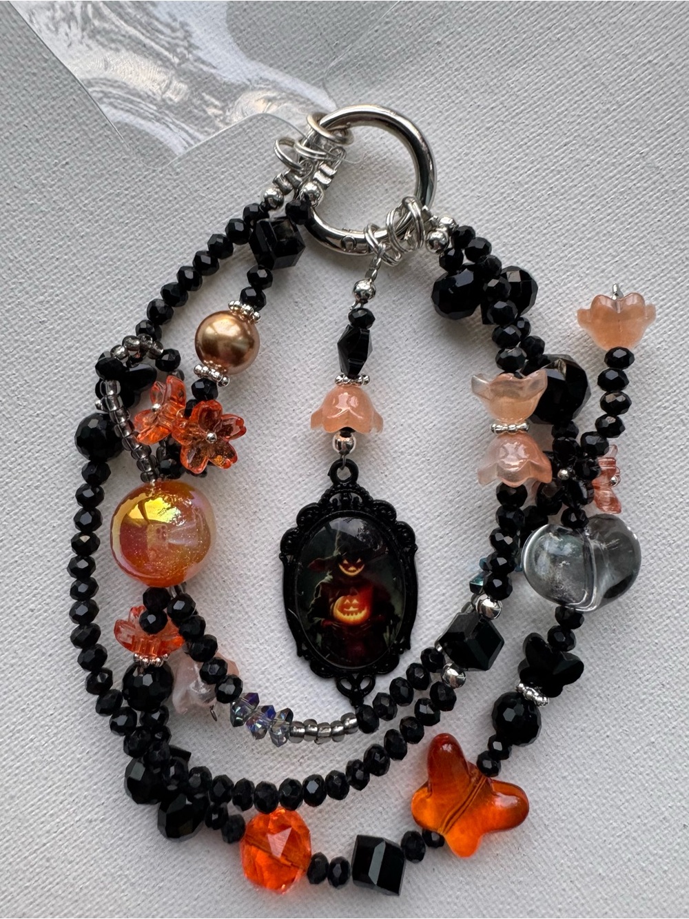 Handcrafted Black and Orange Beaded Halloween Phone Charm